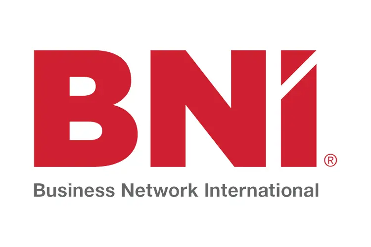 Alt text: Large red initials “BNI” in block sans-serif, right stem of the “N” split by a diagonal cut, gray subtitle “Business Network International.”