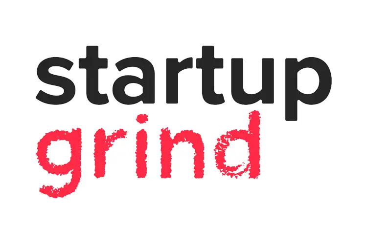 Startup Grind logo with bold black and textured red text, symbolizing global networking and support for creative startups and entrepreneurs.