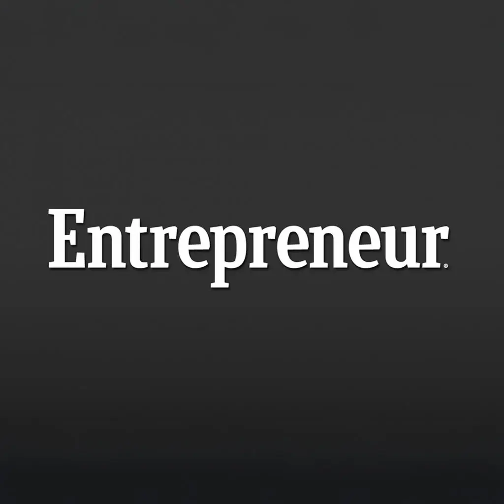 White serif word “Entrepreneur.” on gradient charcoal background, period included in brandmark.