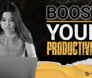Focused female design entrepreneur working on a laptop with text overlay "Boost Your Productivity"