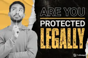 Thinking design entrepreneur holding a pencil, ready to protect her business legally.