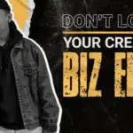 Young design entrepreneur in a denim jacket and hoodie standing confidently next to bold text that reads “Don’t Lose Your Creative Biz Edge” with The DesignLemonade branding.