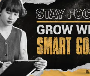 Young designer writing on a digital tablet, focusing on business goals with a thoughtful expression.