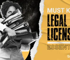 Design entrepreneur carrying a stack of legal documents and business licenses paperwork.