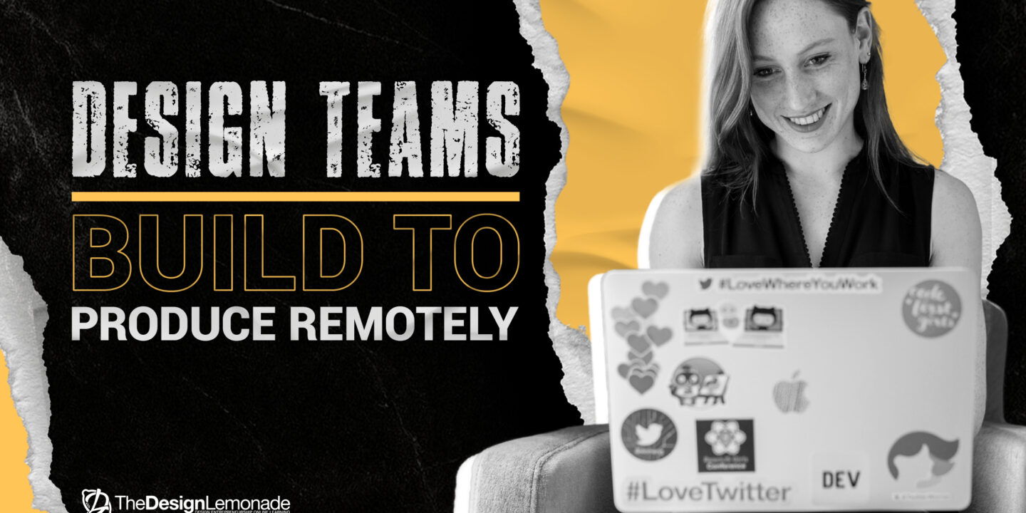 Smiling designer working remotely on a laptop covered with stickers, representing creative collaboration and remote design team productivity.