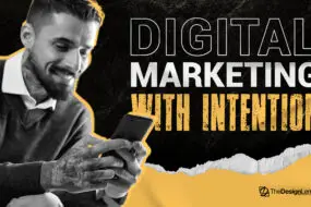 Designer using smartphone beside text “Digital Marketing With Intention.”