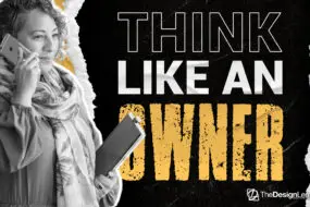 Entrepreneur speaking on phone holding tablet device.