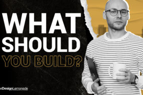 Designer holding tablet and coffee next to text asking what business to build.