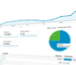 Analytics chart showing visitor growth trends and returning customer data for online digital product sales.