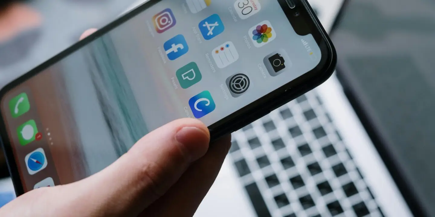 Smartphone displaying mobile applications used for design, prototyping, and content creation.