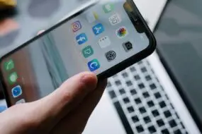 Smartphone displaying mobile applications used for design, prototyping, and content creation.