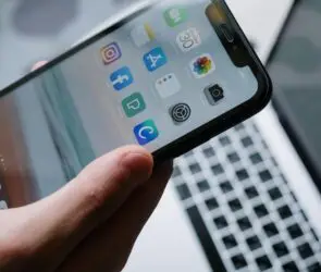 Smartphone displaying mobile applications used for design, prototyping, and content creation.