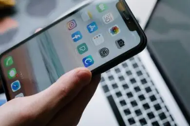 Smartphone displaying mobile applications used for design, prototyping, and content creation.