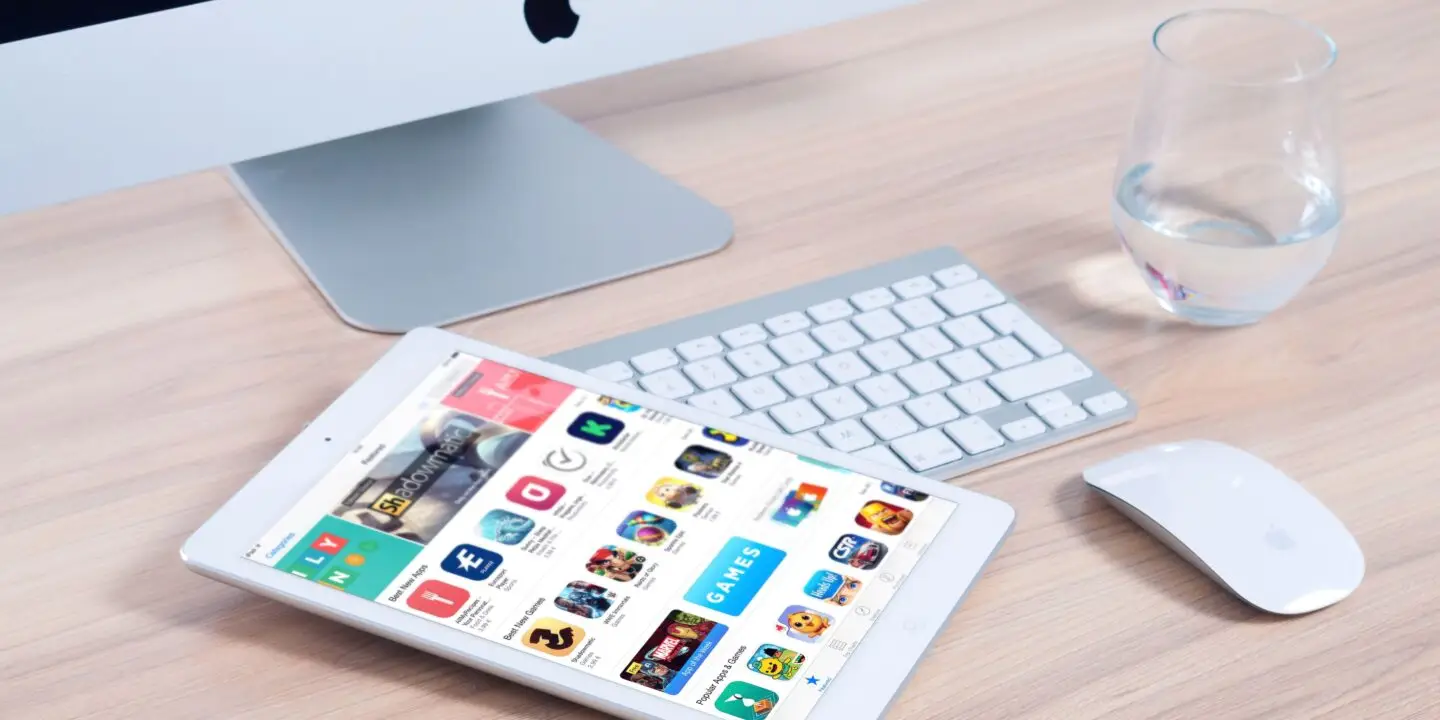 Tablet displaying a marketplace of mobile applications and digital products.