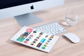 Tablet displaying a marketplace of mobile applications and digital products.