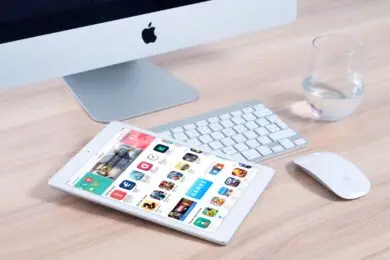 Tablet displaying a marketplace of mobile applications and digital products.